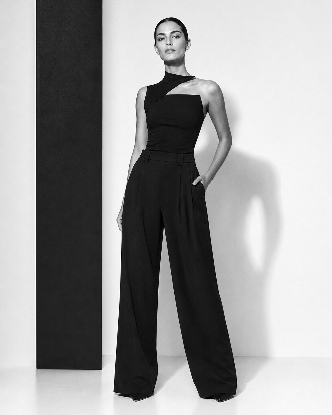 Model wearing the asymmetric Elara Draped Top top